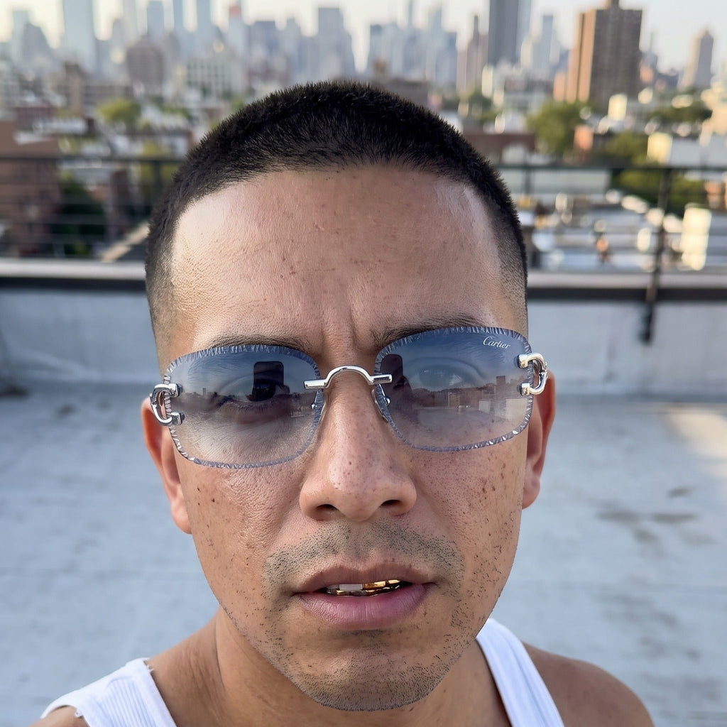 Man wearing the Diamond cut Big C Wires, blue gradient lenses, Cartier eyewear