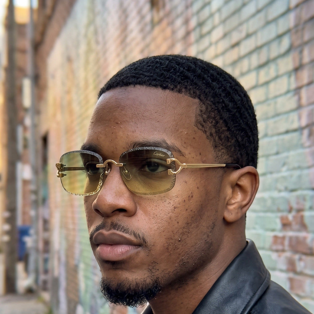 Man wearing the Diamond cut Big C Wires, yellow to green gradient lenses, Cartier eyewear
