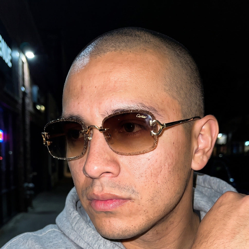 Man wearing the Diamond cut Big C Wires, brown gradient lenses, Cartier eyewear