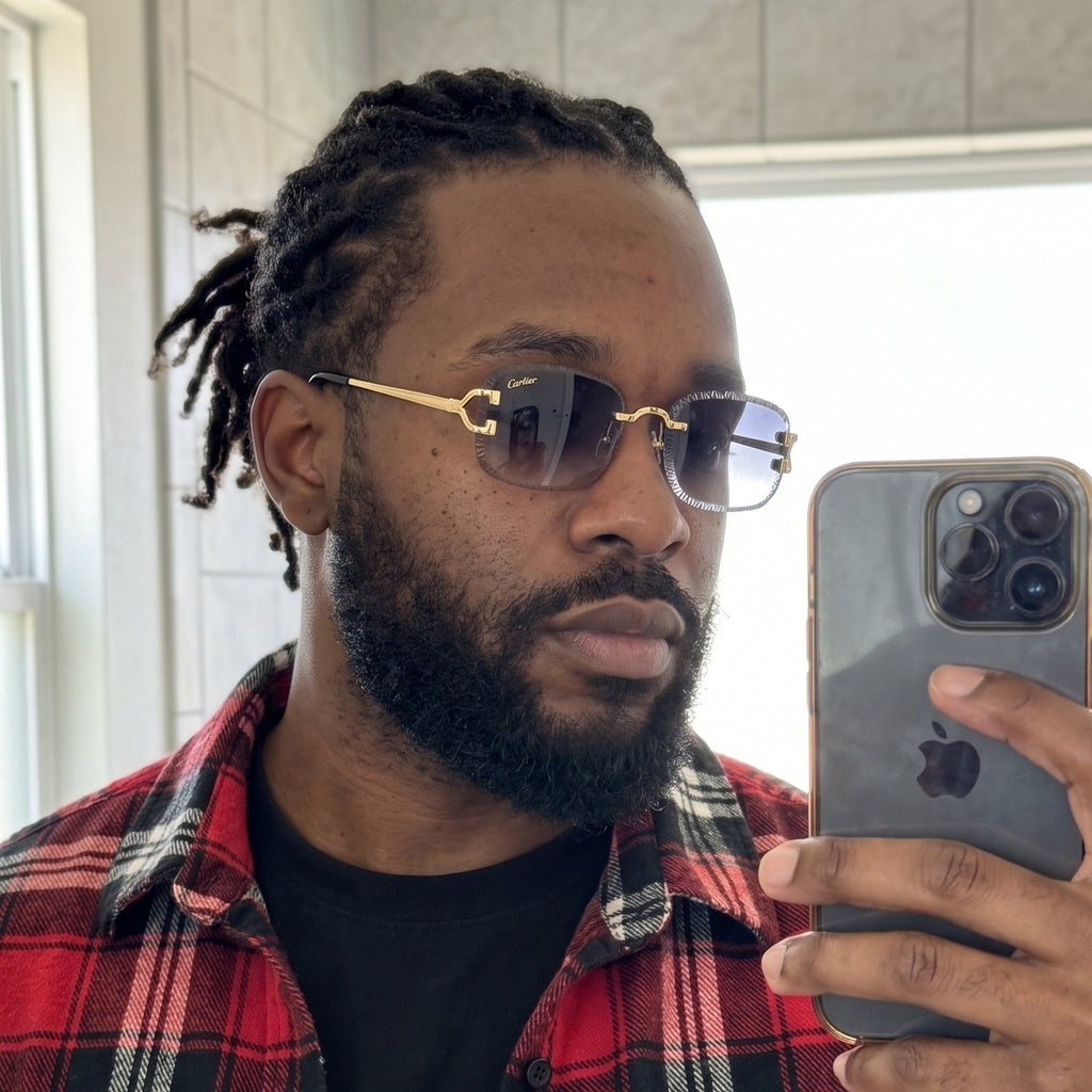 Man wearing the Diamond cut Big C Wires, grey gradient lenses, Cartier eyewear
