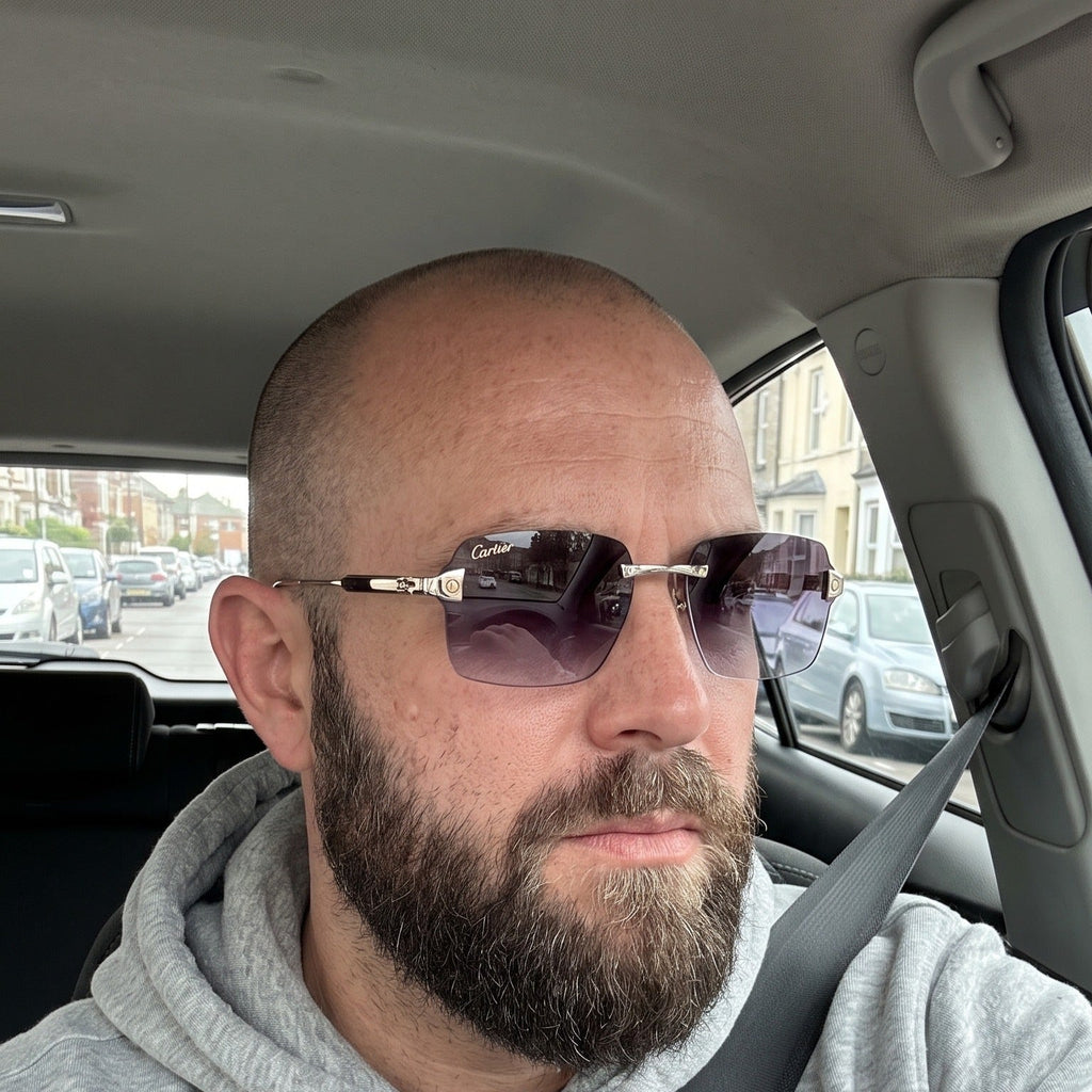Man wearing the Big C Wires, purple gradient lenses, Cartier eyewear