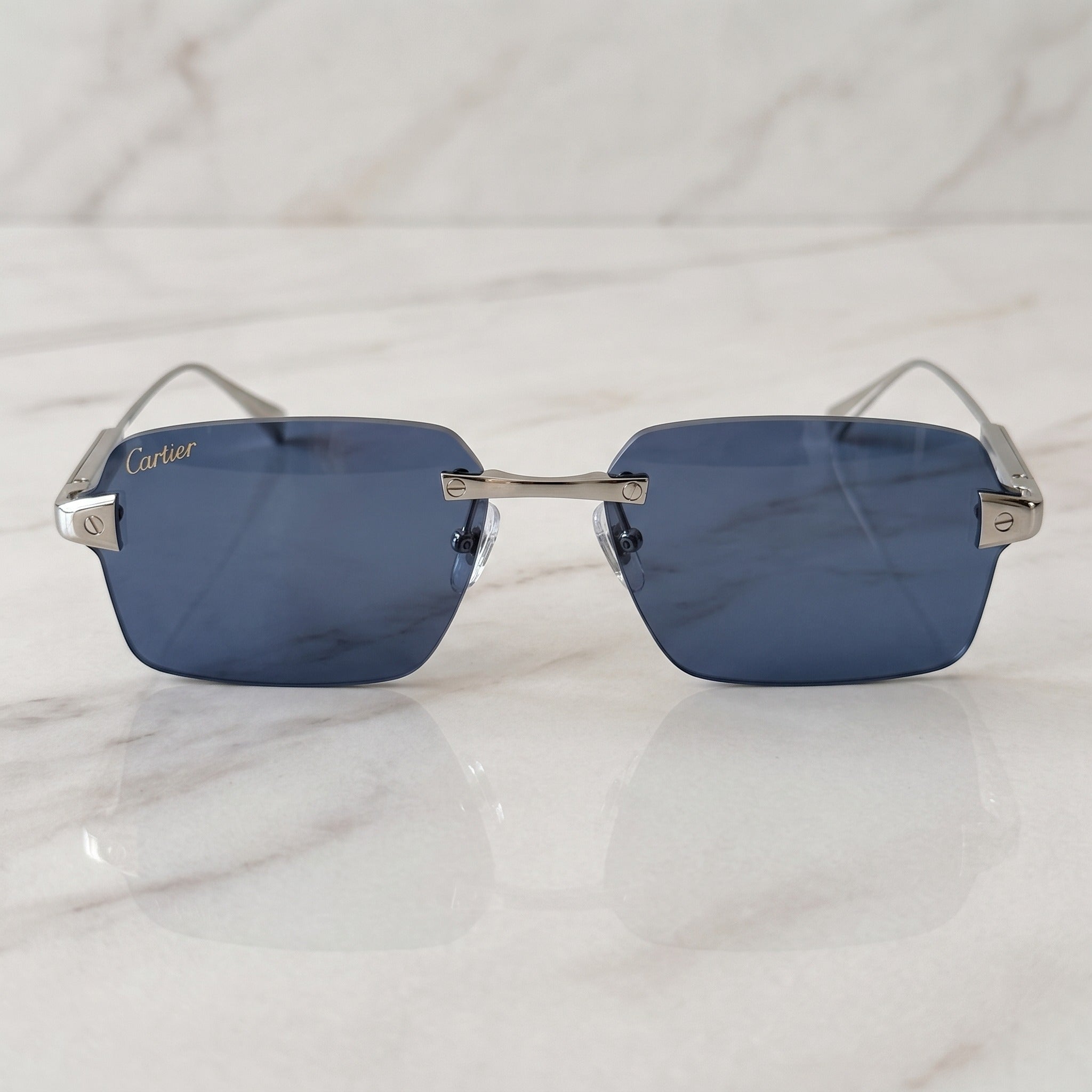 Big C Wires, solid blue lenses, Cartier eyewear