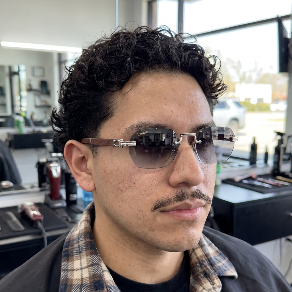 Man wearing the Rimless buffs Sunglasses Detroit style, grey gradient lenses, Cartier eyewear