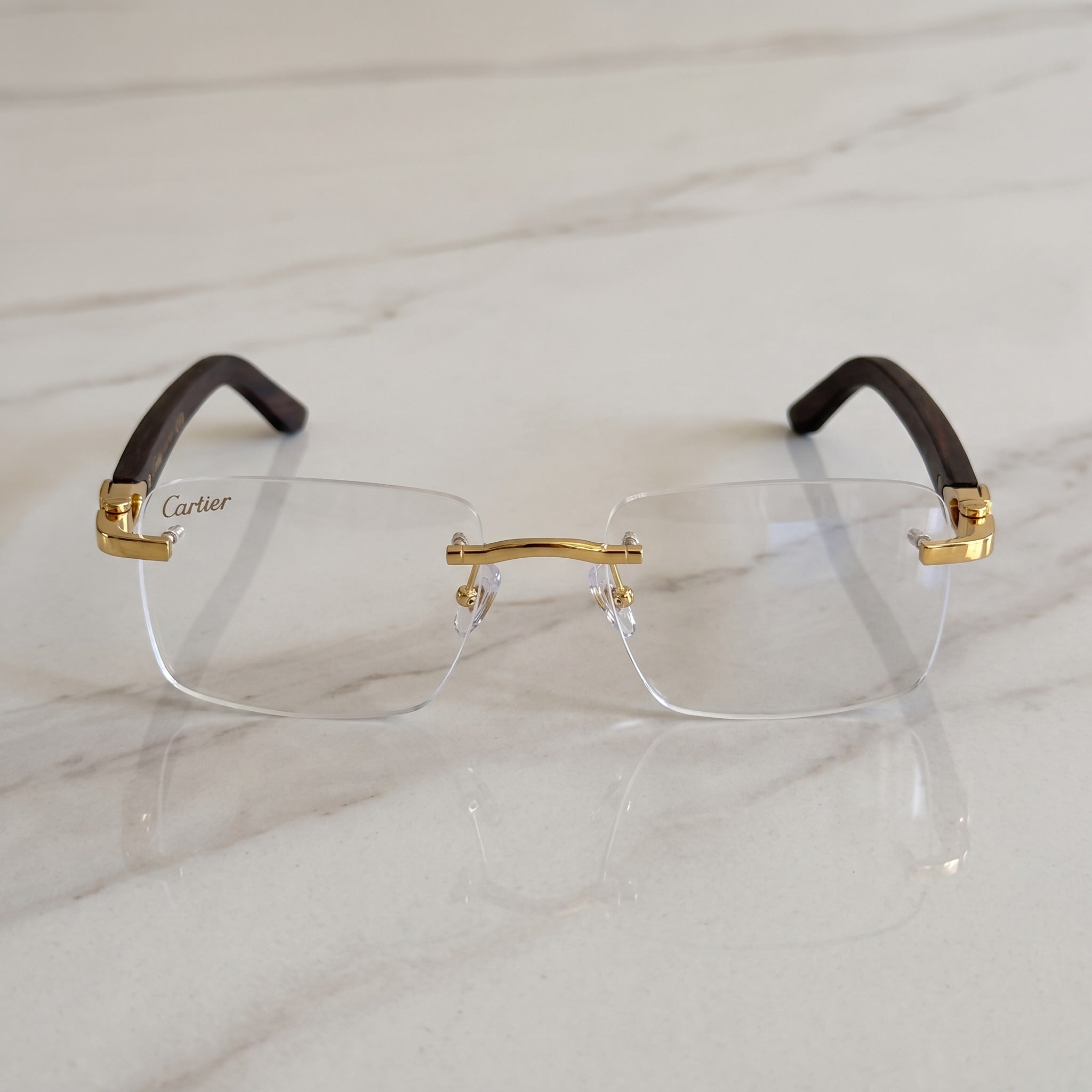 Rimless buffs Glasses, clear lenses, Cartier eyewear