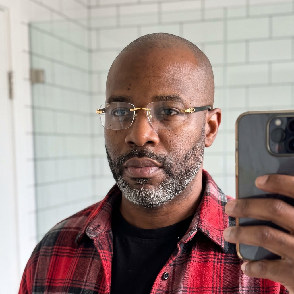 Man wearing the Rimless buffs Glasses, clear lenses, Cartier eyewear