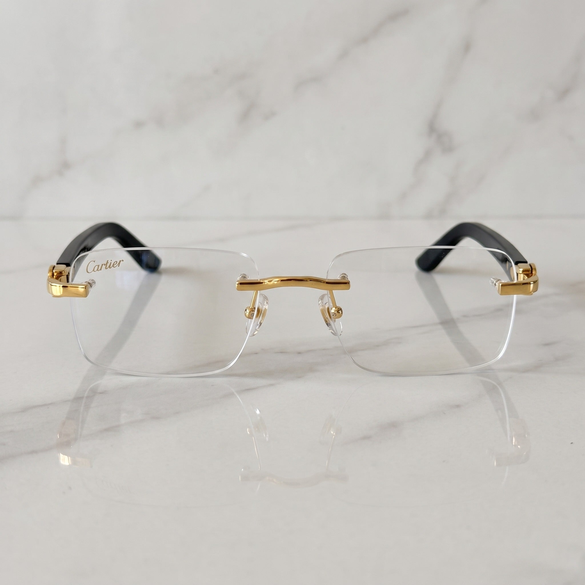 Rimless buffs Glasses, clear lenses, Cartier eyewear