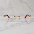 Rimless buffs Glasses, clear lenses, Cartier eyewear