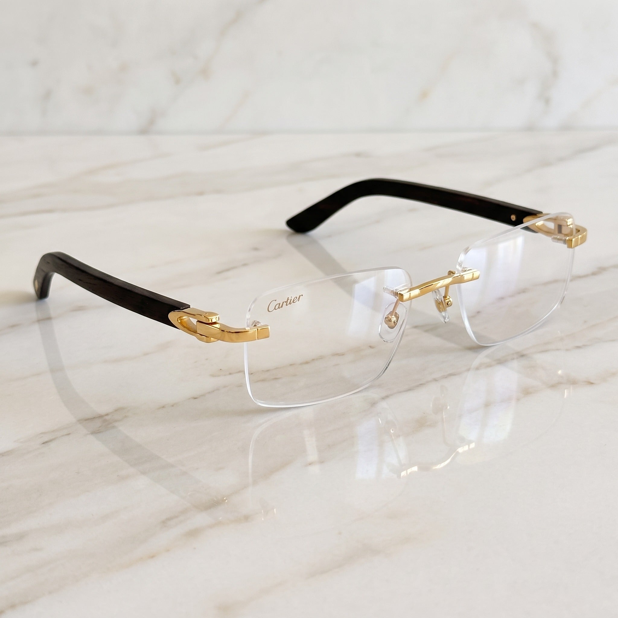 Rimless buffs Glasses, clear lenses, Cartier eyewear