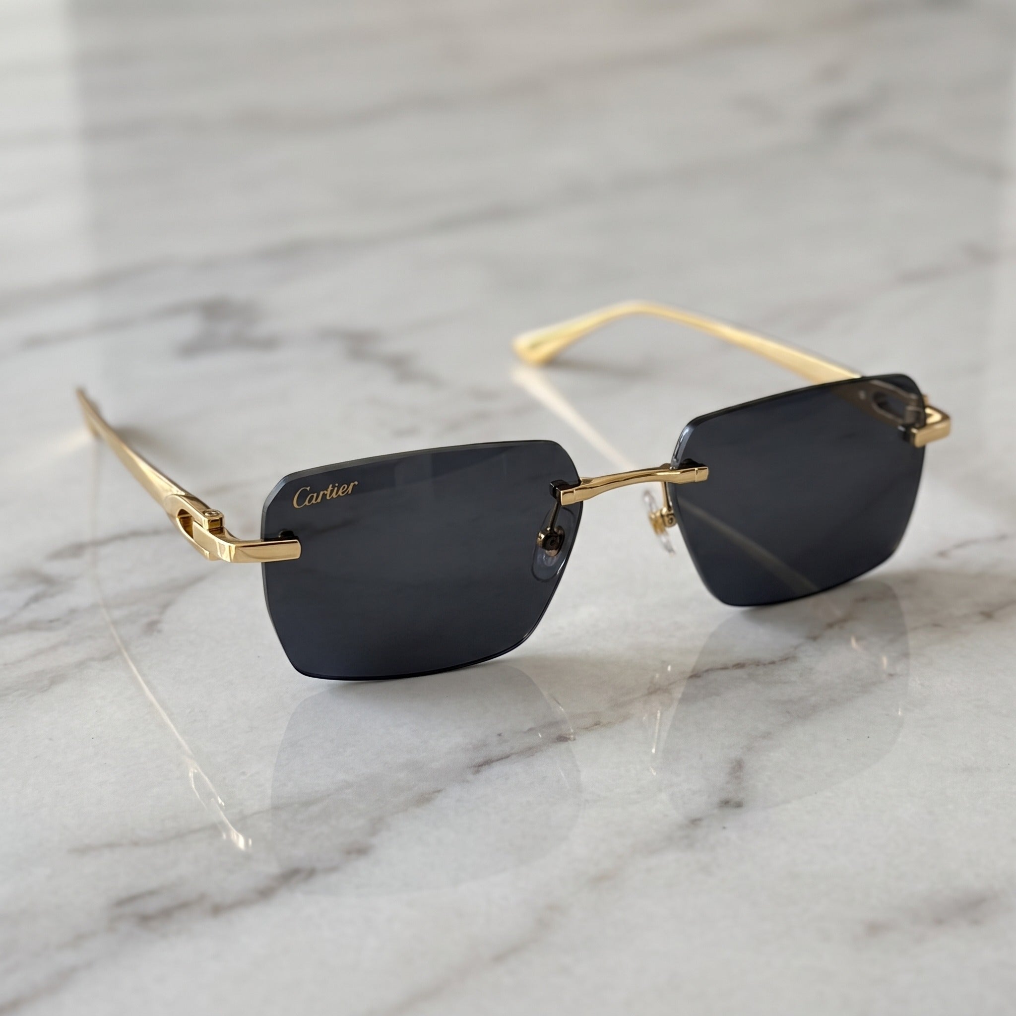 Big C Wires, solid black lenses, Cartier eyewear