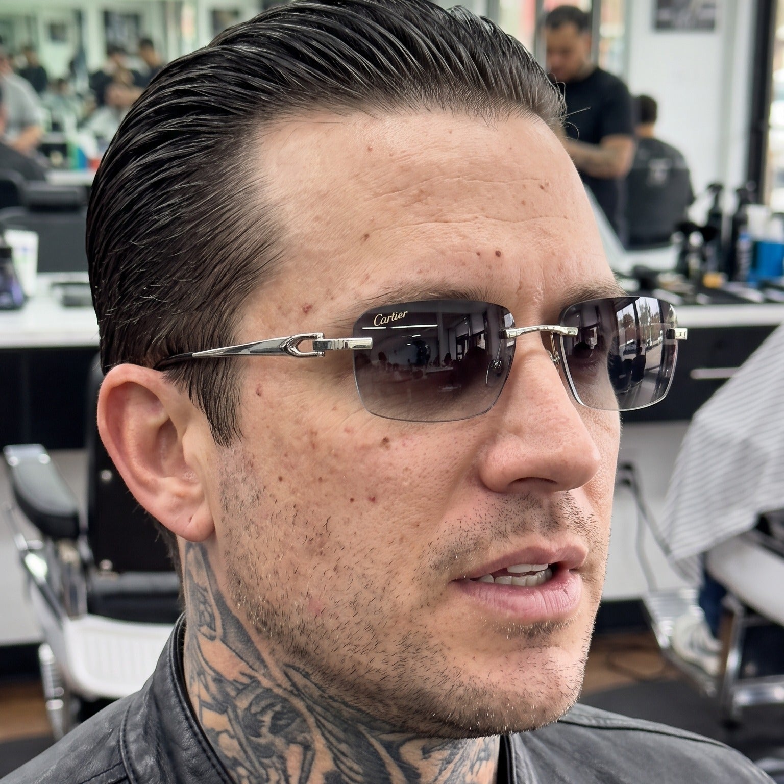 Man wearing the Big C Wires, grey gradient lenses, Cartier eyewear