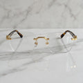 Rimless buffs Glasses, clear lenses, Cartier eyewear