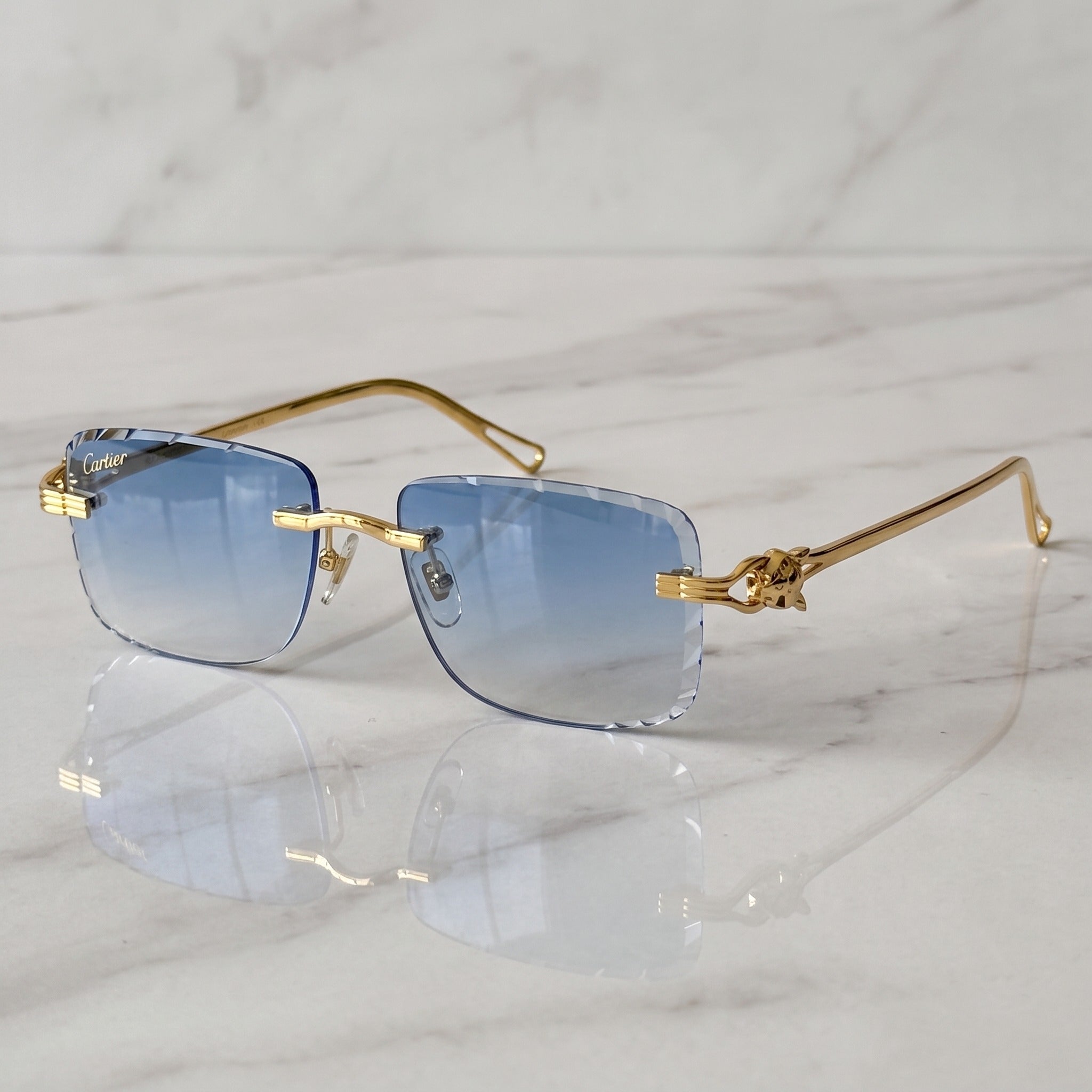 Panther Glasses, blue gradient lenses, Cartier eyewear