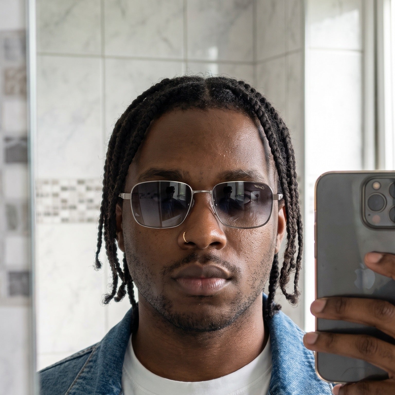 Man wearing the Wire Sunglasses C, grey gradient lenses, Cartier eyewear