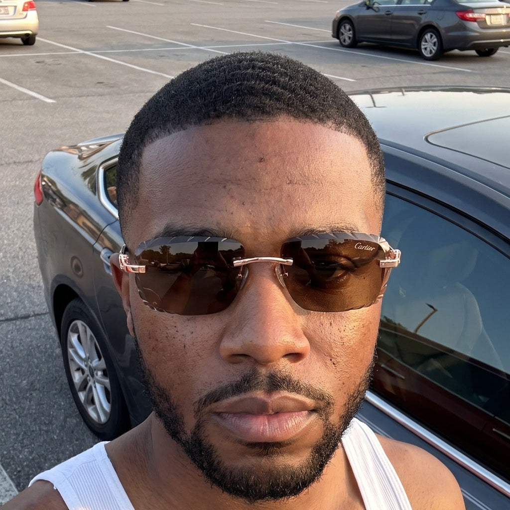 Man wearing the Diamond cut Big C Wires, brown lenses, Cartier eyewear