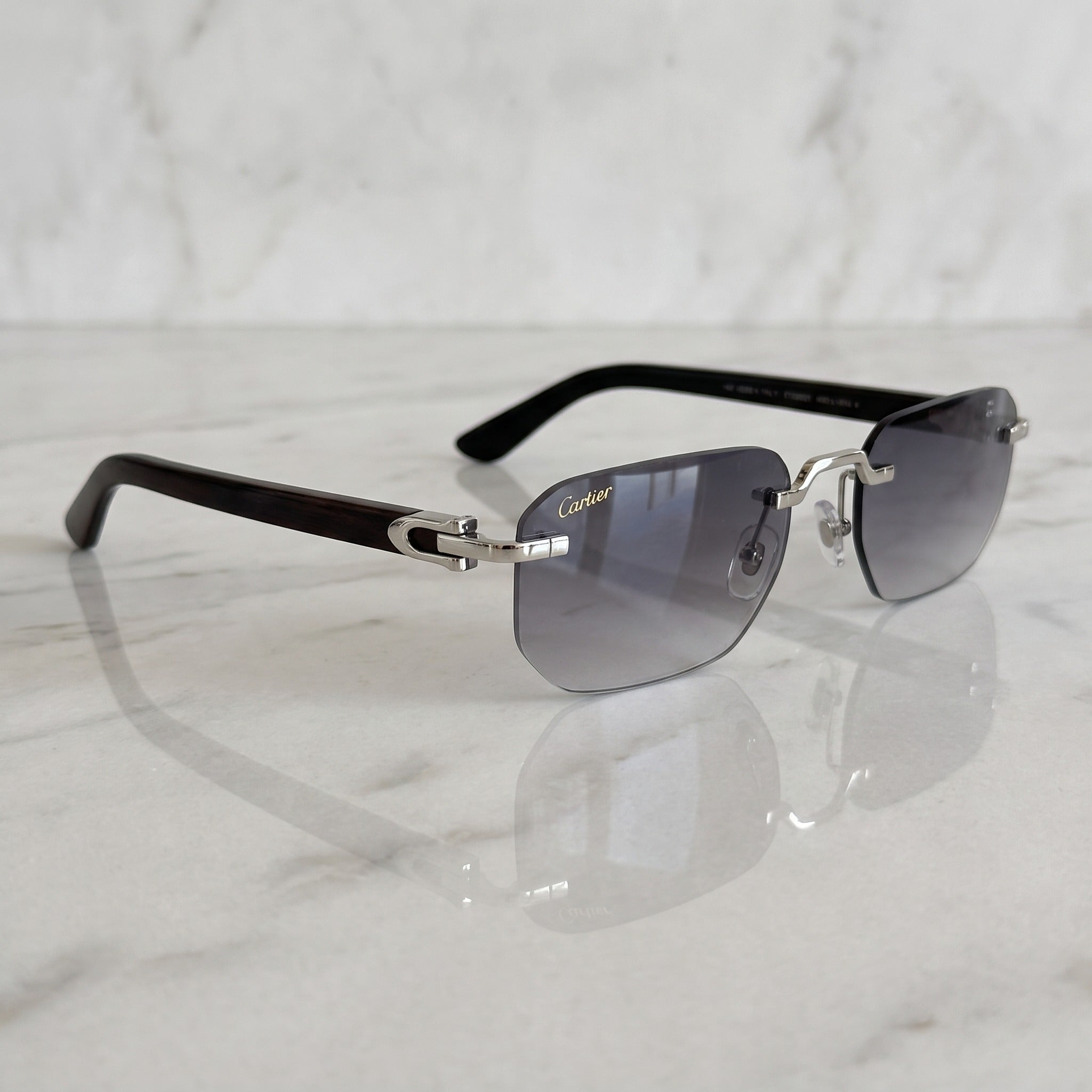 Black Buff Sunglasses, Cartier eyewear