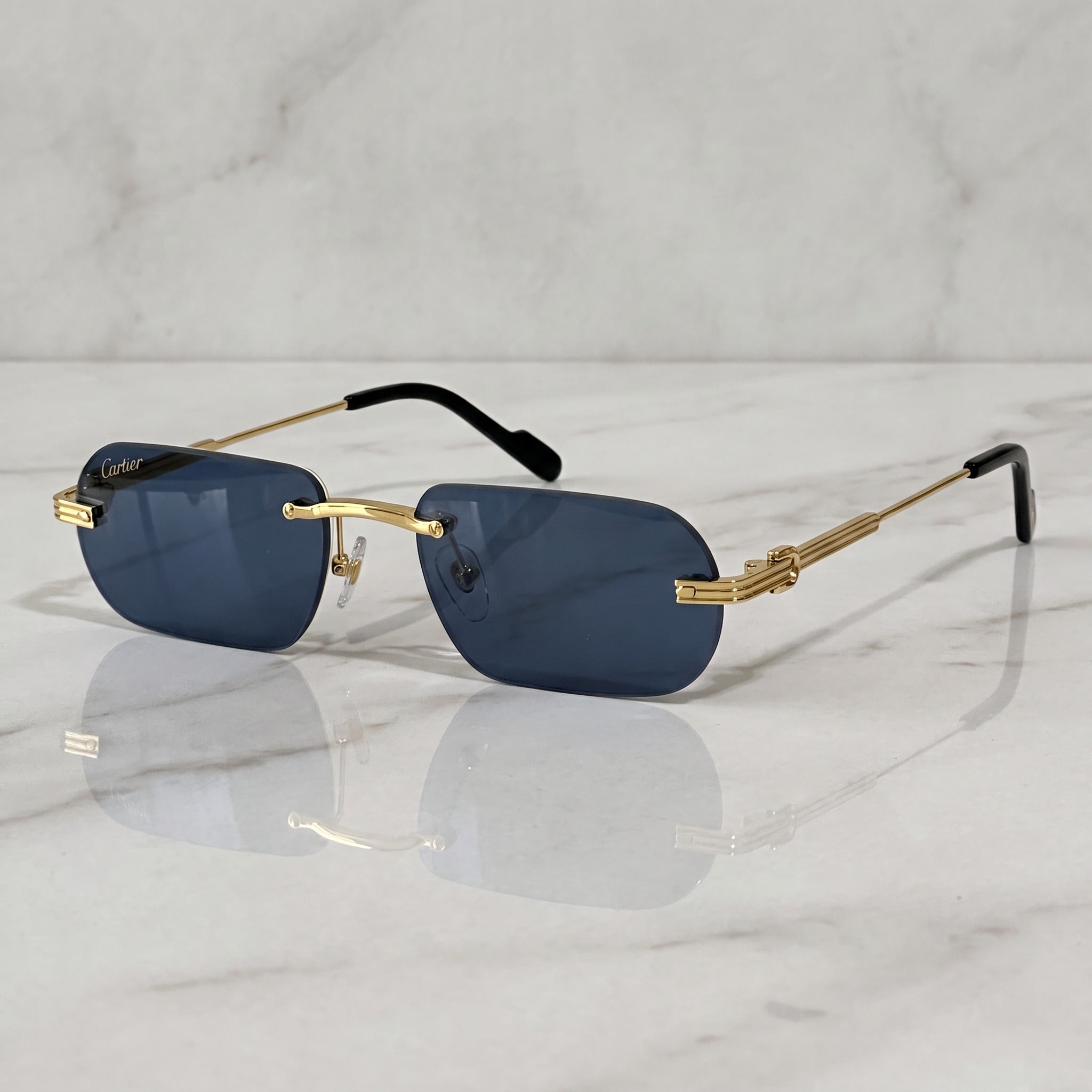 Big C Wires, solid blue lenses, Cartier eyewear