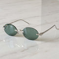 Panther Glasses, solid green lenses, Cartier eyewear