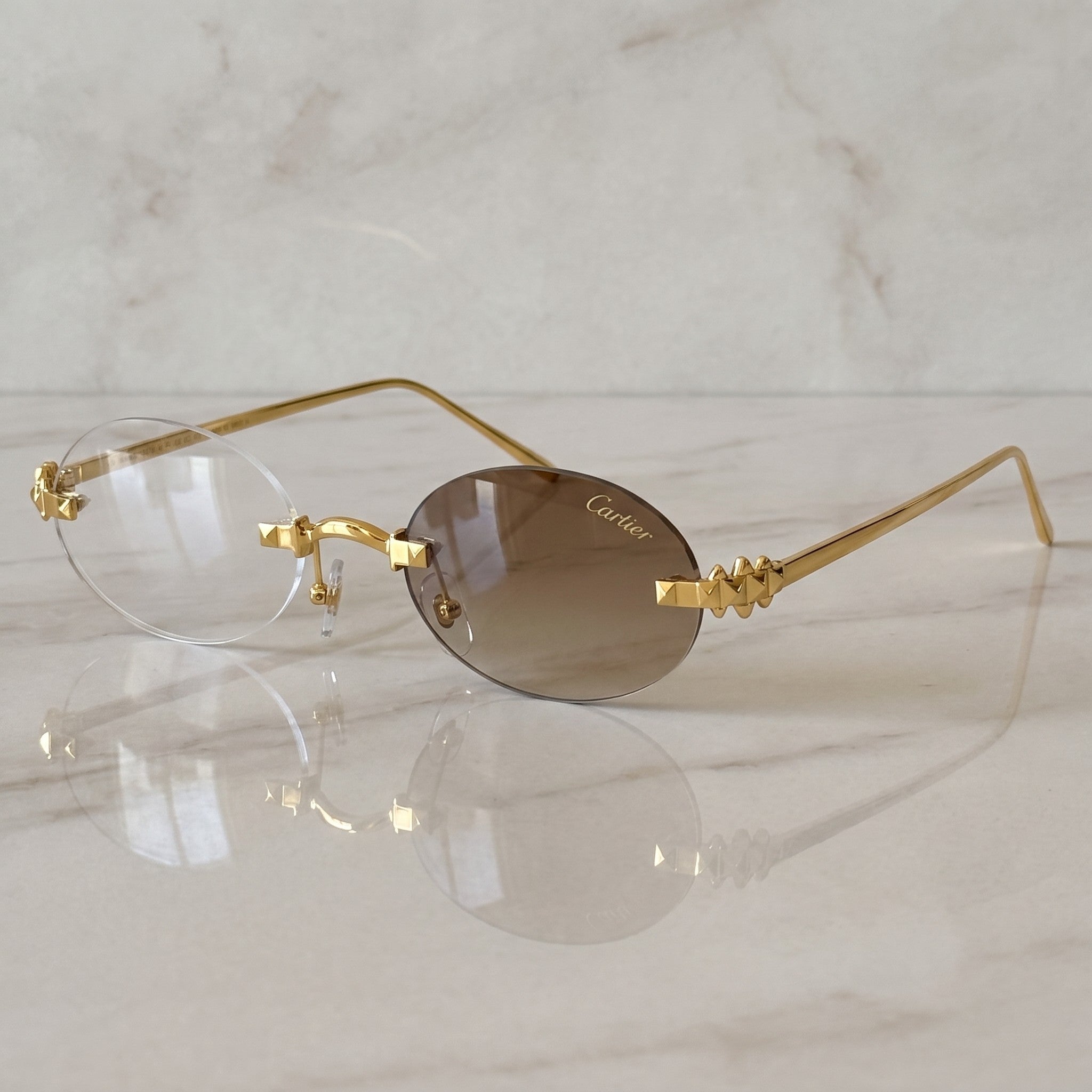 Panther Glasses, transitional lenses, clear to brown, Cartier eyewear