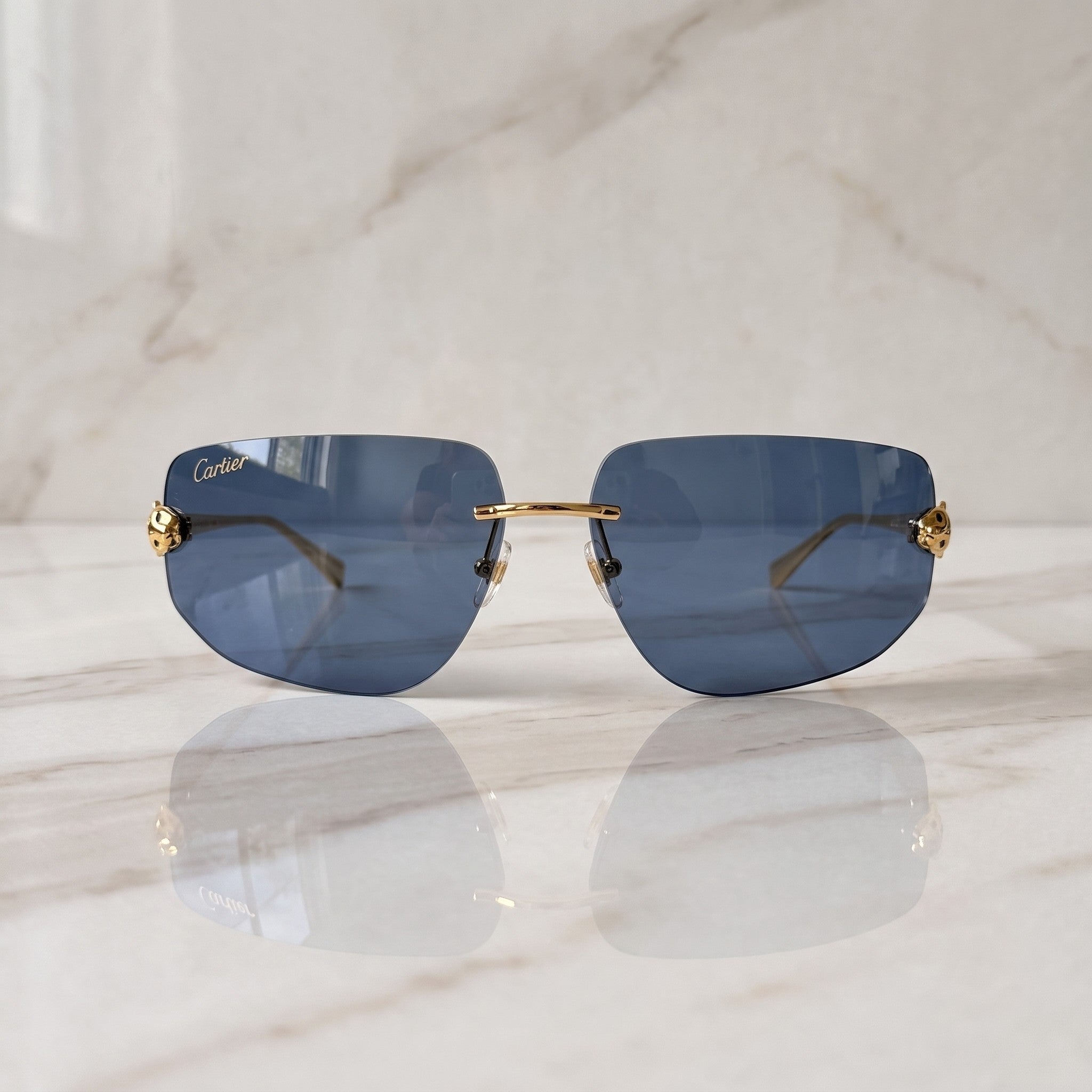 Panther Glasses, solid blue lenses, Cartier eyewear