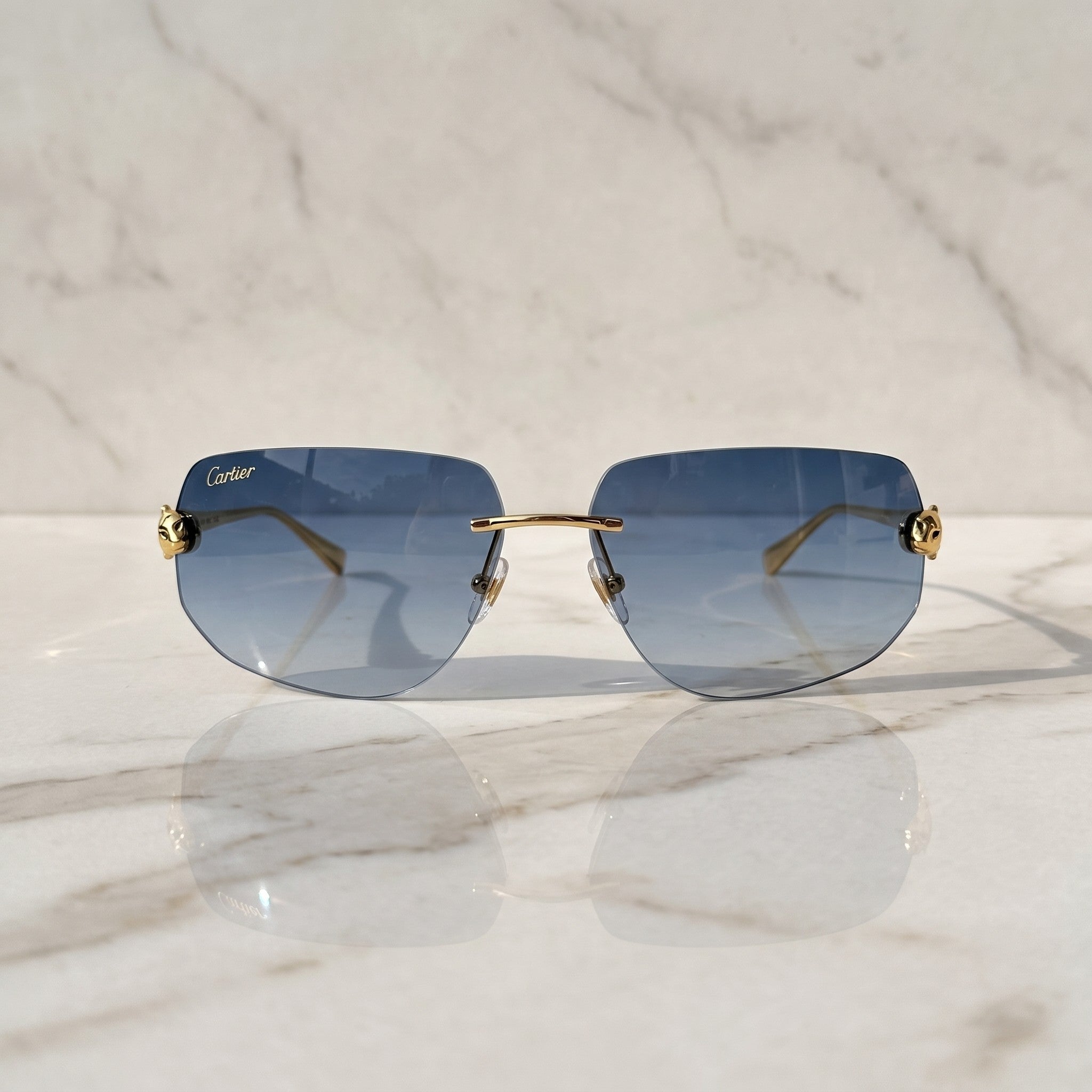 Panther Glasses, blue gradient lenses, Cartier eyewear