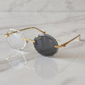 Panther Glasses, transitional lenses, clear to grey, Cartier eyewear