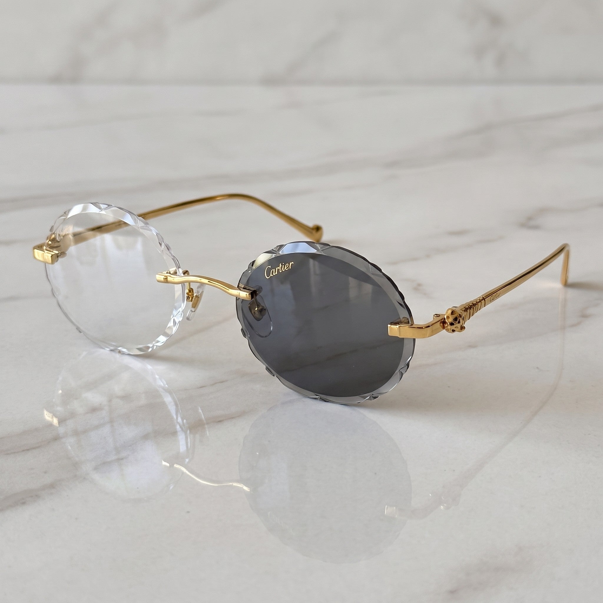 Panther Glasses, transitional lenses, clear to grey, Cartier eyewear