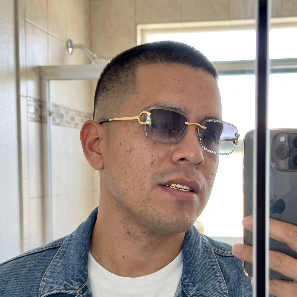Man wearing the Iced out C wire glasses, grey gradient lenses, Cartier eyewear
