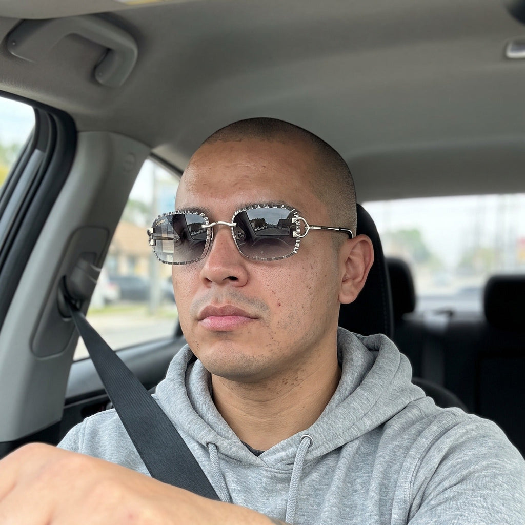 Man wearing the Iced out C wire glasses, grey gradient lenses, Cartier eyewear